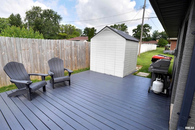4527 N Nelson Dr, Peoria, IL 61614 - wooden terrace featuring a storage shed and a grill
