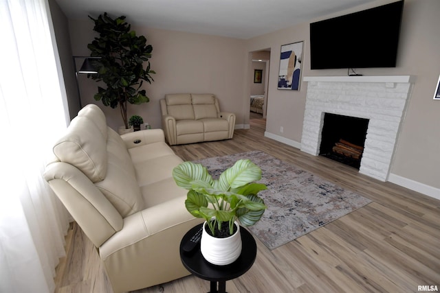 4527 N Nelson Dr, Peoria, IL 61614 - living area with wood finished floors and a fireplace