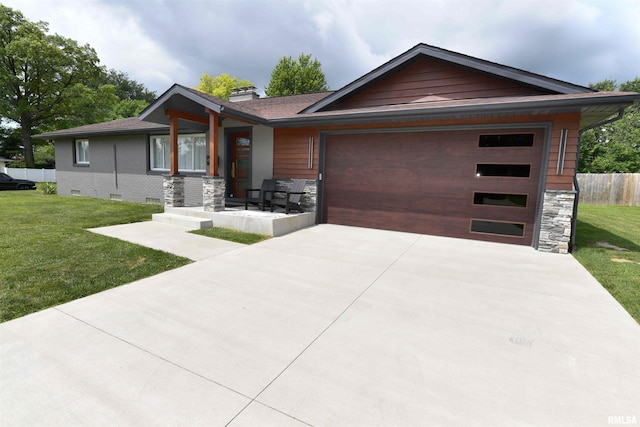 4527 N Nelson Dr, Peoria, IL 61614 - modern home featuring a garage, driveway, and a chimney