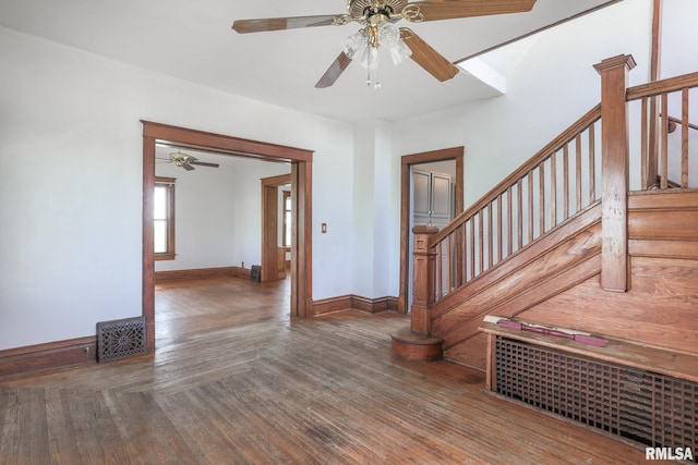 5610 W Lakeshore Dr, Princeville, IL 61559 - unfurnished room with a ceiling fan, stairs, and parquet flooring