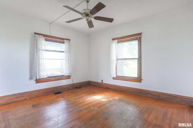 5610 W Lakeshore Dr, Princeville, IL 61559 - empty room with wood finished floors and ceiling fan