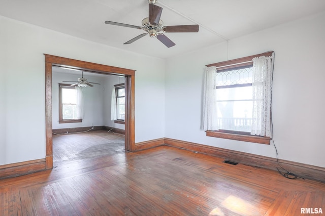 5610 W Lakeshore Dr, Princeville, IL 61559 - empty room featuring ceiling fan and wood finished floors