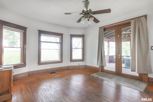 5610 W Lakeshore Dr, Princeville, IL 61559 - empty room featuring french doors, wood-type flooring, and ceiling fan