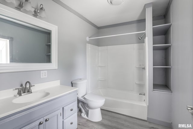 5610 W Lakeshore Dr, Princeville, IL 61559 - bathroom featuring vanity, wood finished floors, and shower / tub combination