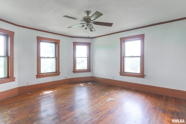 5610 W Lakeshore Dr, Princeville, IL 61559 - empty room featuring hardwood / wood-style floors, ornamental molding, and ceiling fan