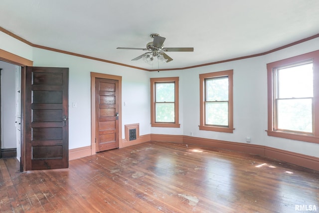 5610 W Lakeshore Dr, Princeville, IL 61559 - unfurnished room featuring hardwood / wood-style floors, ornamental molding, and a ceiling fan