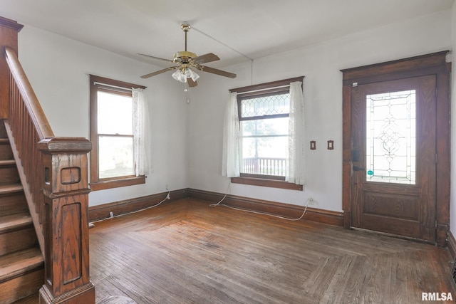 5610 W Lakeshore Dr, Princeville, IL 61559 - entrance foyer featuring stairway, plenty of natural light, ceiling fan, and wood finished floors