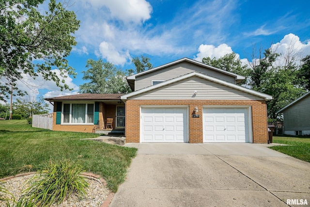 6412 N Brookwood Ln, Peoria, IL 61614 - view of front facade featuring brick siding, concrete driveway, a front lawn, and an attached garage