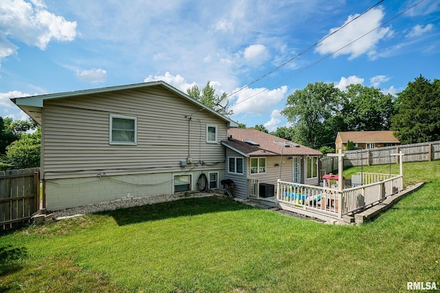 6412 N Brookwood Ln, Peoria, IL 61614 - back of house featuring a fenced backyard and a wooden deck