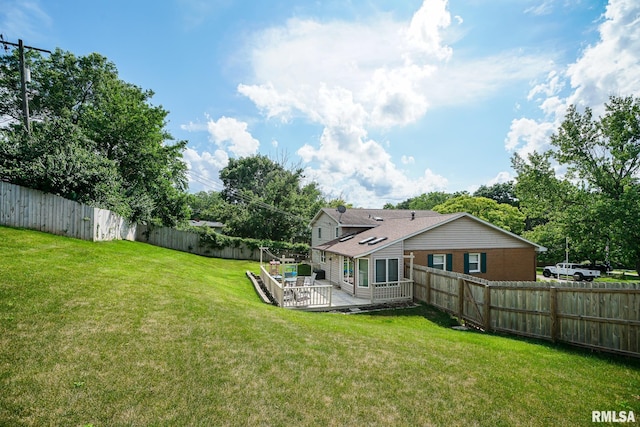6412 N Brookwood Ln, Peoria, IL 61614 - fenced backyard with a patio area