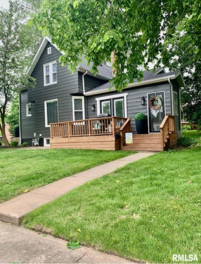 600 E Jefferson St, Washington, IL 61571 - back of property with a wooden deck and a yard