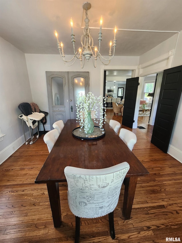 600 E Jefferson St, Washington, IL 61571 - dining space with a chandelier and wood finished floors
