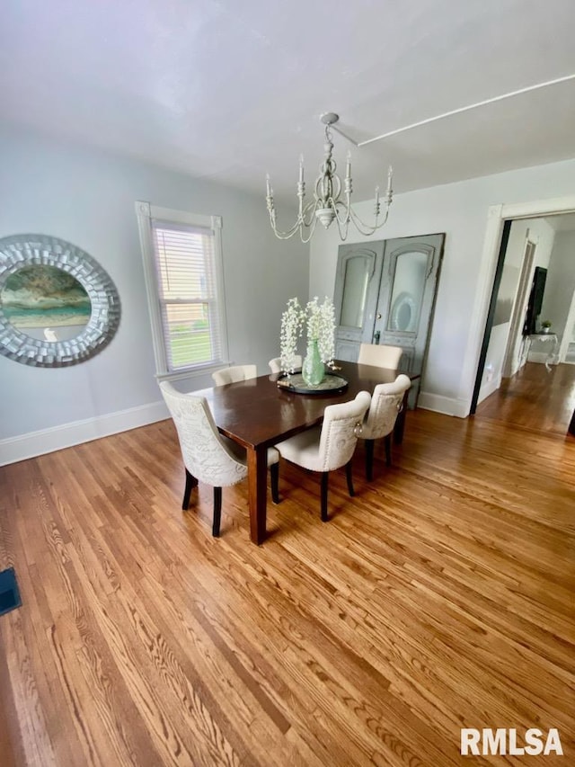 600 E Jefferson St, Washington, IL 61571 - dining area featuring light wood-style flooring and a chandelier