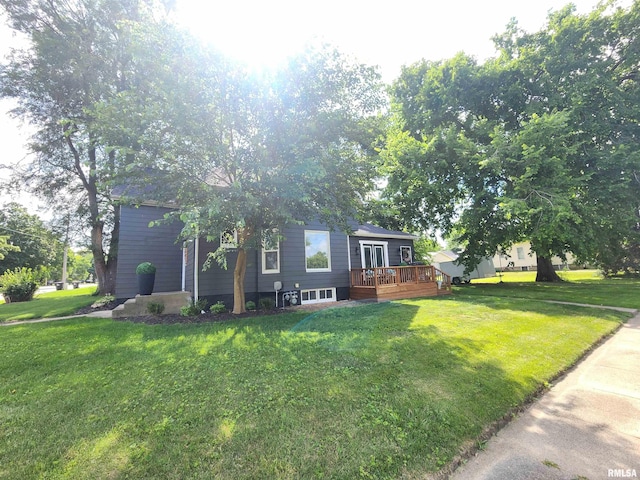 600 E Jefferson St, Washington, IL 61571 - view of front of home featuring a deck and a front lawn