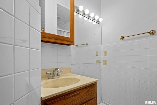 1426 N Main St, East Peoria, IL 61611 - bathroom with vanity and tile walls