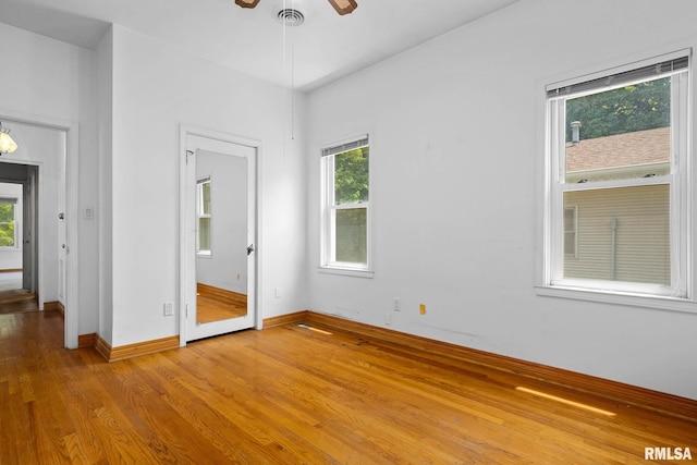 1426 N Main St, East Peoria, IL 61611 - unfurnished bedroom featuring light wood-type flooring and baseboards
