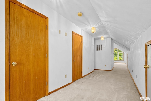 1426 N Main St, East Peoria, IL 61611 - additional living space with vaulted ceiling and light carpet