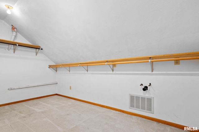 1426 N Main St, East Peoria, IL 61611 - spacious closet with vaulted ceiling and light colored carpet