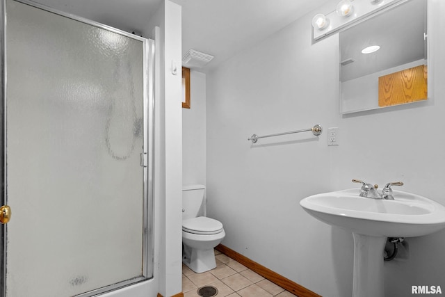 1426 N Main St, East Peoria, IL 61611 - full bathroom featuring tile patterned flooring and a shower stall