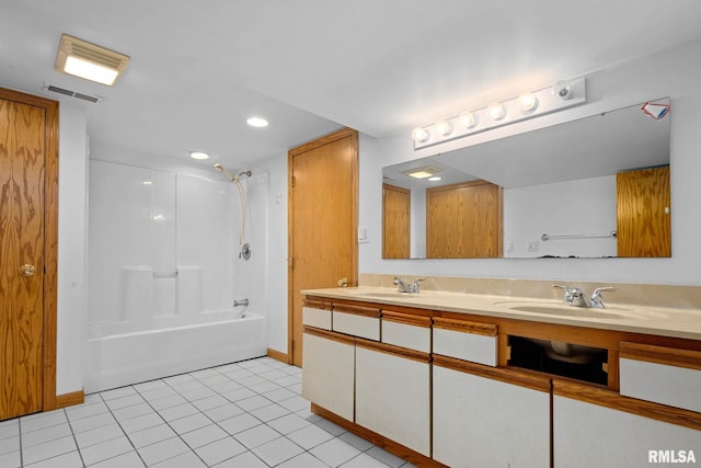 1426 N Main St, East Peoria, IL 61611 - bathroom with double vanity, washtub / shower combination, tile patterned floors, and recessed lighting