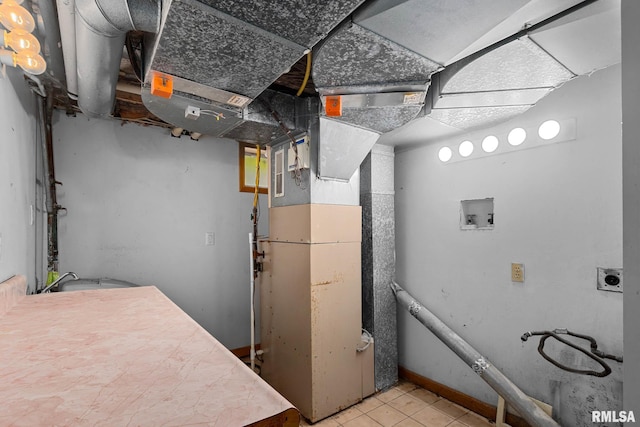 1426 N Main St, East Peoria, IL 61611 - utility room with heating unit