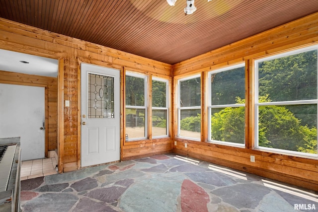 1426 N Main St, East Peoria, IL 61611 - unfurnished sunroom featuring wood walls