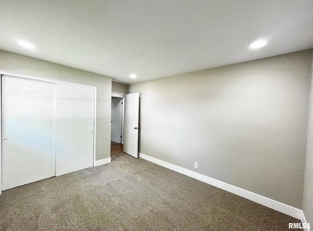 4914 N Bevalon Pl, Peoria, IL 61614 - unfurnished bedroom featuring carpet floors, recessed lighting, and a closet
