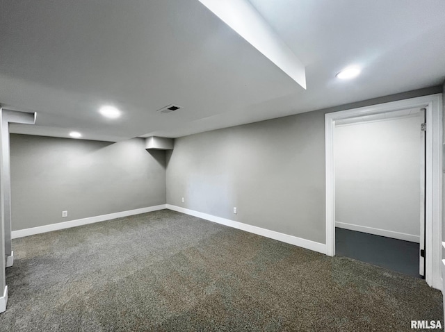 4914 N Bevalon Pl, Peoria, IL 61614 - finished basement featuring dark colored carpet and recessed lighting