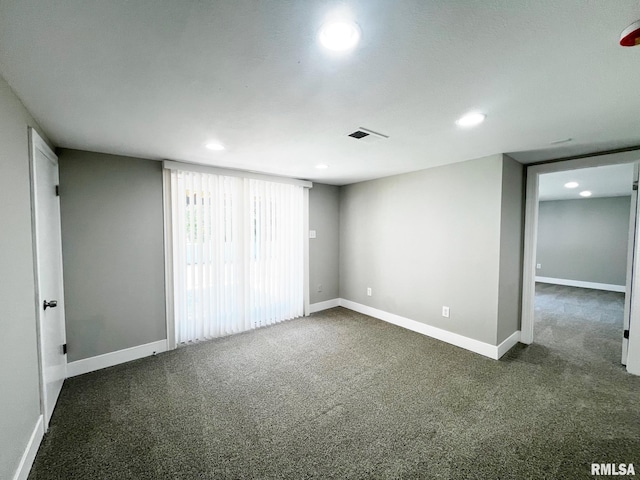 4914 N Bevalon Pl, Peoria, IL 61614 - unfurnished room with dark colored carpet and recessed lighting