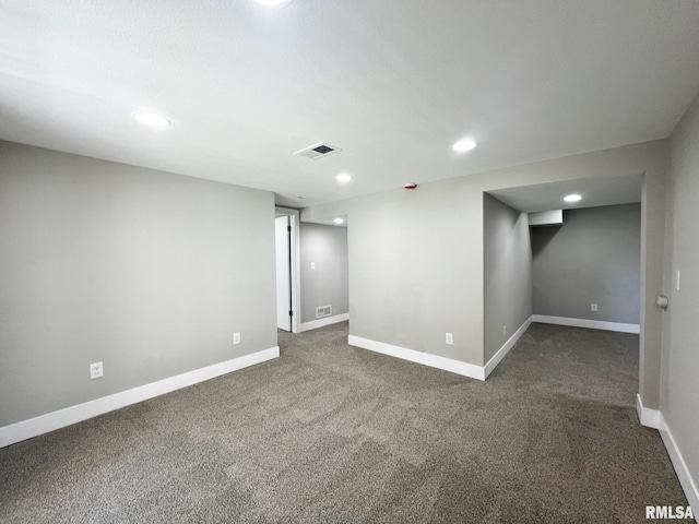 4914 N Bevalon Pl, Peoria, IL 61614 - spare room with dark carpet and recessed lighting