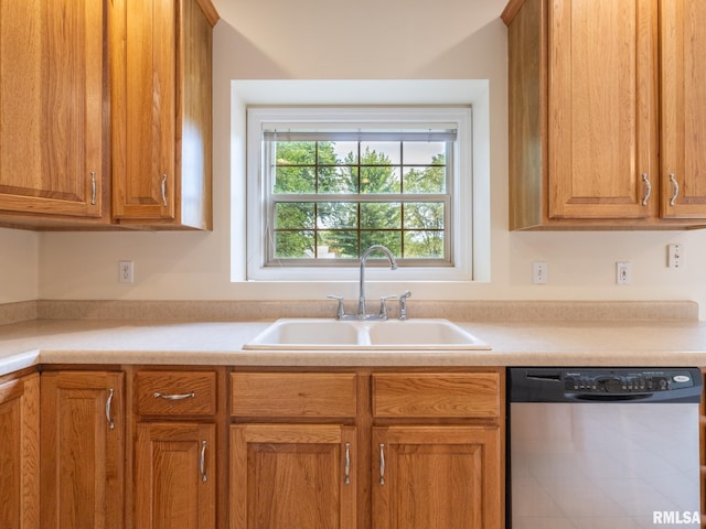 919 W Brookforest Dr, Peoria, IL 61615 - kitchen with stainless steel dishwasher, light countertops, and brown cabinetry
