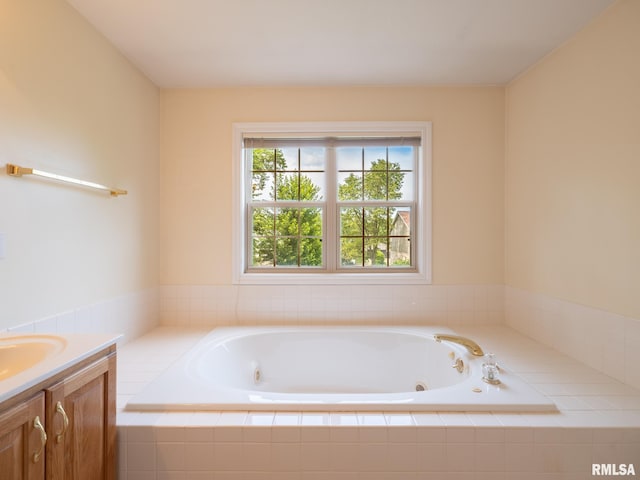 919 W Brookforest Dr, Peoria, IL 61615 - bathroom featuring a tub with jets and vanity