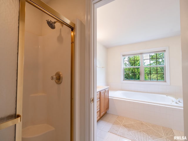 919 W Brookforest Dr, Peoria, IL 61615 - bathroom with a stall shower, tile patterned flooring, a garden tub, and vanity