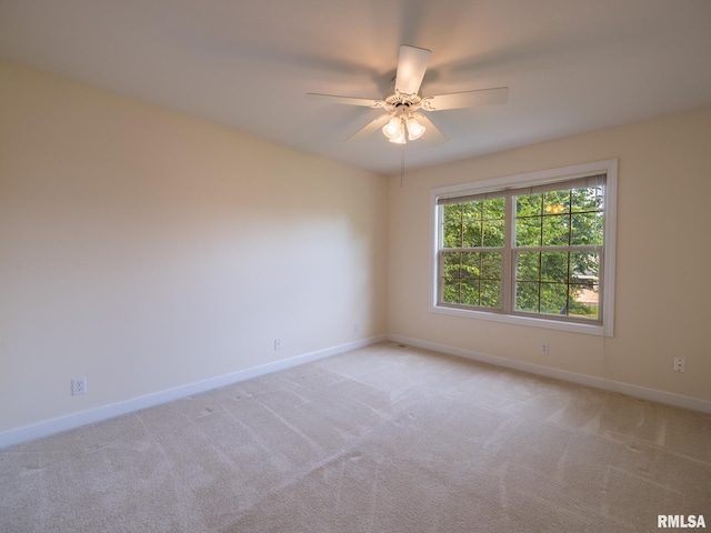 919 W Brookforest Dr, Peoria, IL 61615 - unfurnished room with light carpet and ceiling fan