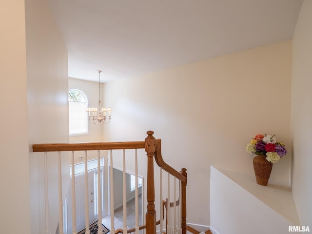 919 W Brookforest Dr, Peoria, IL 61615 - staircase featuring a chandelier