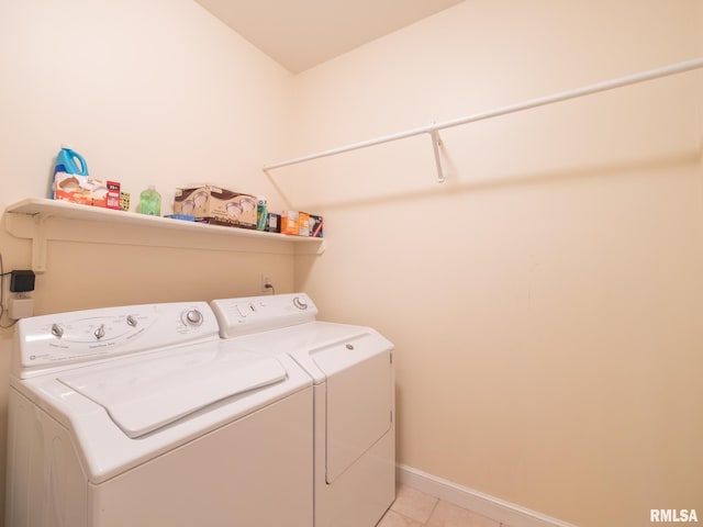919 W Brookforest Dr, Peoria, IL 61615 - washroom with washer and dryer and light tile patterned floors