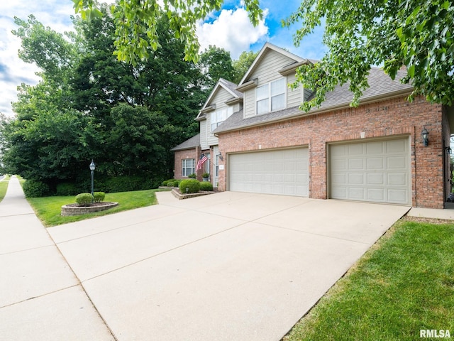 919 W Brookforest Dr, Peoria, IL 61615 - traditional-style home featuring brick siding, driveway, roof with shingles, and a front lawn