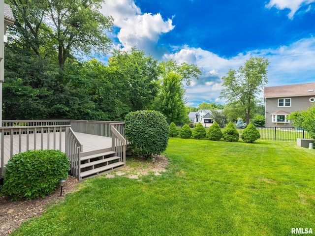 919 W Brookforest Dr, Peoria, IL 61615 - view of yard with a wooden deck