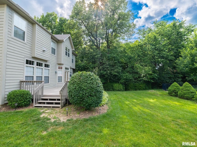 919 W Brookforest Dr, Peoria, IL 61615 - view of grassy yard with a deck