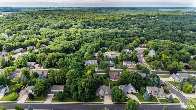919 W Brookforest Dr, Peoria, IL 61615 - aerial perspective of suburban area featuring a heavily wooded area