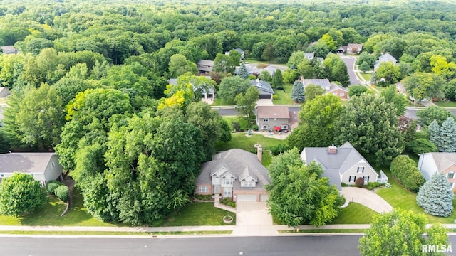 919 W Brookforest Dr, Peoria, IL 61615 - aerial perspective of suburban area featuring a heavily wooded area