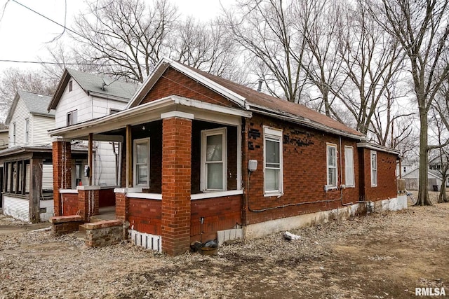 1710 NE Madison Ave, Peoria, IL 61603 - view of home's exterior with covered porch