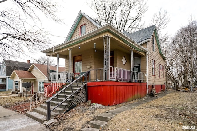 1821 N Indiana Ave, Peoria, IL 61603 - view of front of house with covered porch and stairway