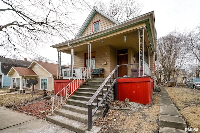 1821 N Indiana Ave, Peoria, IL 61603 - view of front facade with a porch and stairway