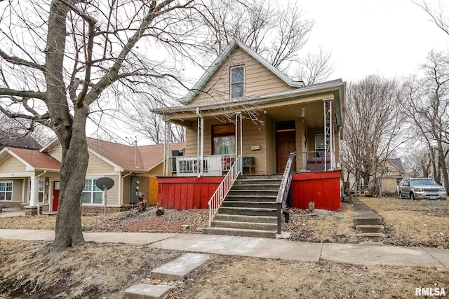 1821 N Indiana Ave, Peoria, IL 61603 - view of front of home with covered porch and stairs