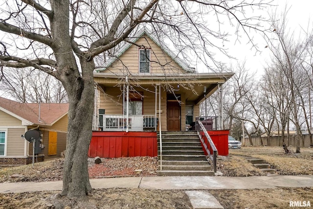 1821 N Indiana Ave, Peoria, IL 61603 - view of front of property featuring a porch and stairway