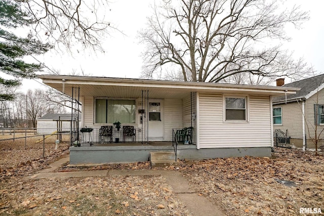 1831 S Kneer Ave, Peoria, IL 61605 - rear view of house featuring covered porch