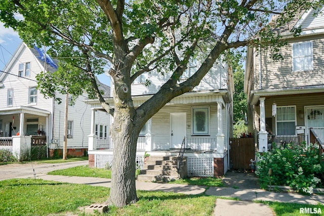 506 Spring St, Peoria, IL 61603 - view of front facade with a porch
