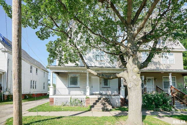 506 Spring St, Peoria, IL 61603 - view of front facade featuring covered porch