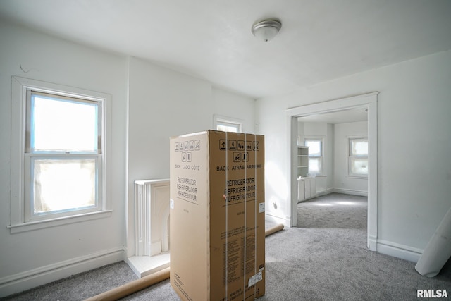 506 Spring St, Peoria, IL 61603 - interior space featuring carpet flooring and baseboards